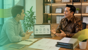 Klien berkonsultasi tentang peran SLF bersama konsultan di kantor modern dengan tampilan presentasi legalitas bangunan.